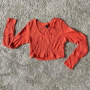 Orange long sleeve crop top